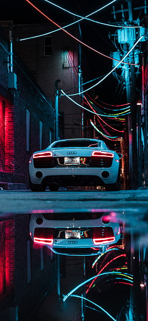 Audi R8 Rear View in Neon-Lit Urban Alley with Water Reflection HD phone wallpaper