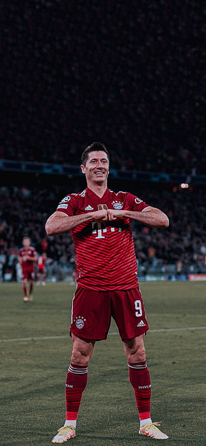 Robert Lewandowski in Bayern Munich Home Kit Performing Heart Gesture on the Pitch HD phone wallpaper