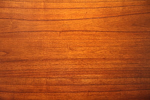 Warm Orange Wood Grain Texture with Natural Horizontal Plank Patterns HD wallpaper