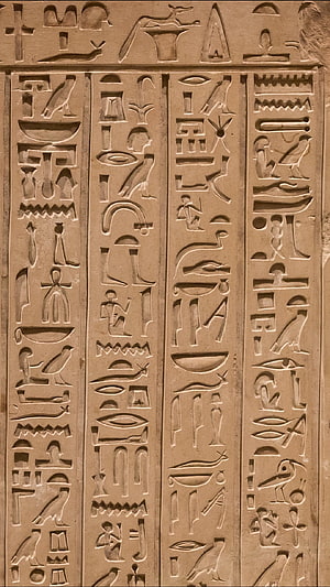 Ancient Egyptian Hieroglyphic Carvings on a Sandstone Wall Panel HD phone wallpaper