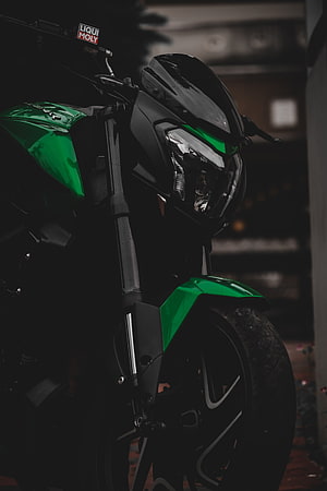 Bajaj Dominar 400 Green and Black Sport Motorcycle Front Headlight Close-Up HD phone wallpaper
