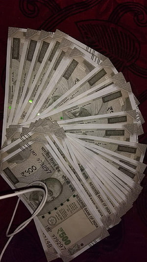 Fanned Stack of Indian 500 Rupee Banknotes on Dark Red Fabric HD phone wallpaper