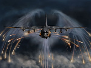 Lockheed AC-130 Spectre Gunship Firing Tracers Through Night Clouds HD wallpaper