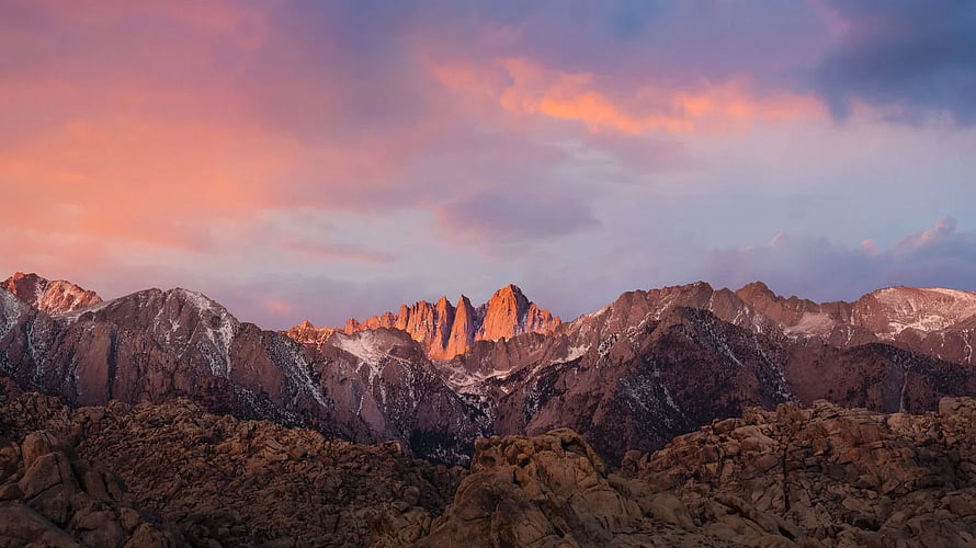 Alpine Mountain Range at Sunset with Pink Clouds and Snow-Capped Peaks HD wallpaper