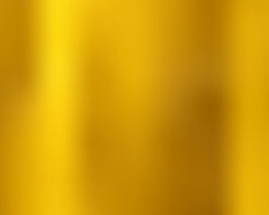 Golden Metal Gradient Background with Soft Blurred Texture and Warm Tones HD wallpaper