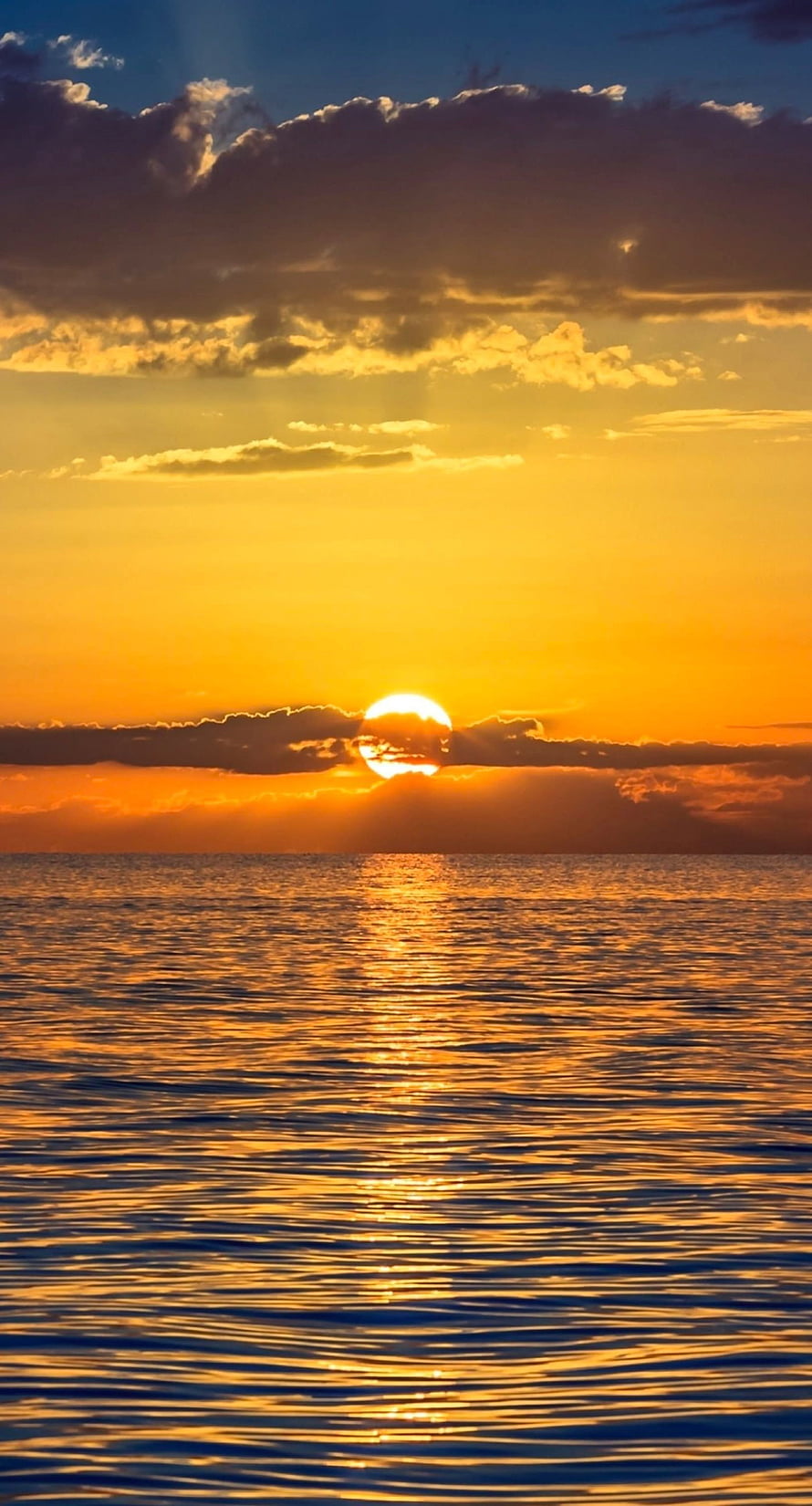 Golden Ocean Sunset with Dramatic Clouds and Sun Reflection on Water HD phone wallpaper