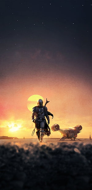 The Mandalorian Walking Through Desert Dunes at Sunset with Beskar Armor and Speeder Bike HD phone wallpaper