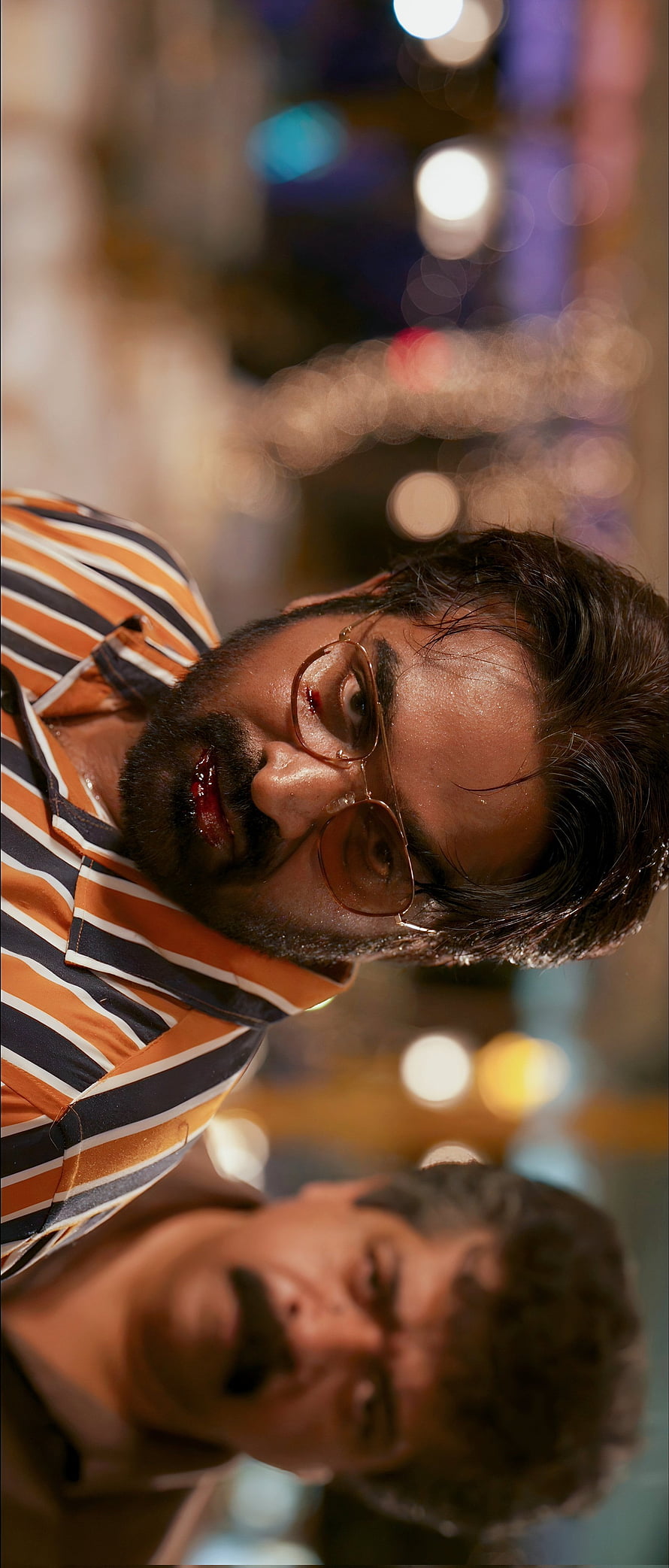 Vijay Sethupathi in Vikram with round glasses and striped shirt in dramatic cinematic scene HD phone wallpaper