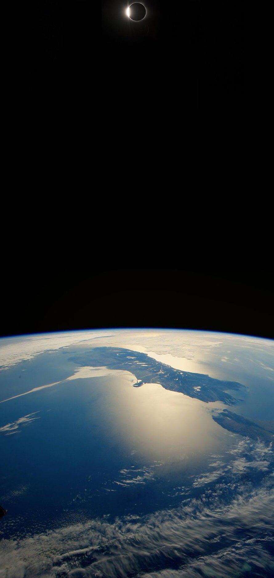 Total Solar Eclipse Over Earth's Curved Horizon From Space HD phone wallpaper