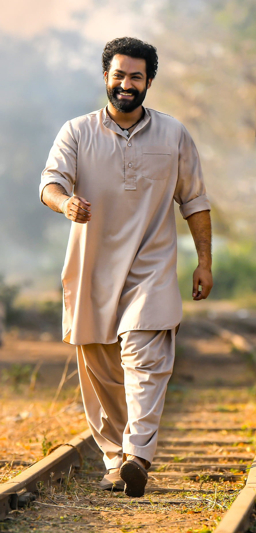 Jr NTR Walking on Railway Tracks in Traditional Kurta HD phone wallpaper