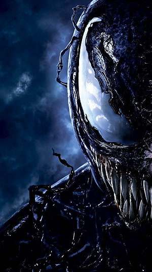 Venom Close-Up Portrait with Glowing Eyes and Sharp Teeth Against Dark Misty Background HD phone wallpaper