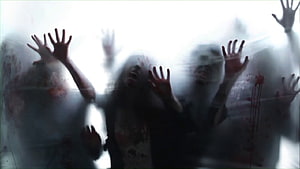 Horror Scene of Zombie Hands Pressed Against Frosted Glass With Blood Stains HD wallpaper