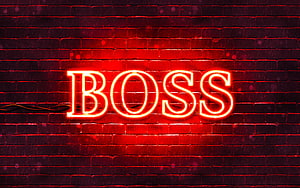 Hugo Boss red neon sign glowing on a dark brick wall HD wallpaper