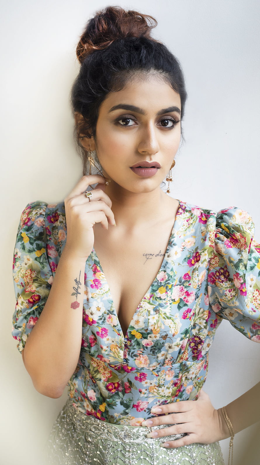 Priya Prakash Warrior in Floral Puff Sleeve Dress with High Bun Hairstyle HD phone wallpaper