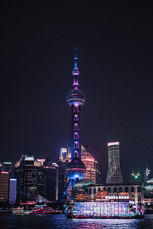 Shanghai Oriental Pearl Tower Illuminated at Night Over the Huangpu River HD phone wallpaper