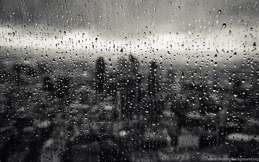Moody Black and White Raindrops on a Window with a Blurred City Skyline HD wallpaper
