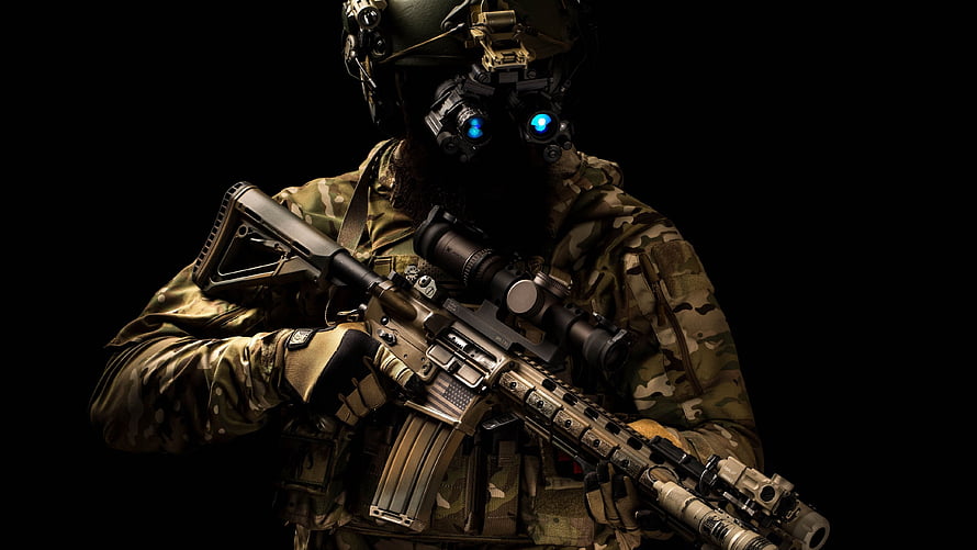 Tactical Soldier in Camouflage Gear Holding Modern Assault Rifle with Night Vision Goggles HD wallpaper