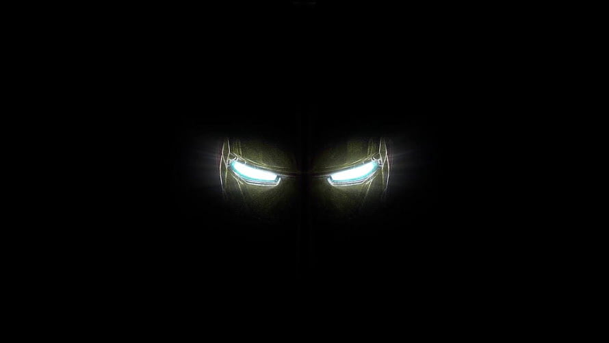 Iron Man Glowing Eyes in Darkness Minimalist Cinematic Portrait HD wallpaper