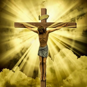 Jesus Christ on the Cross with Divine Golden Light Rays and Clouds HD wallpaper