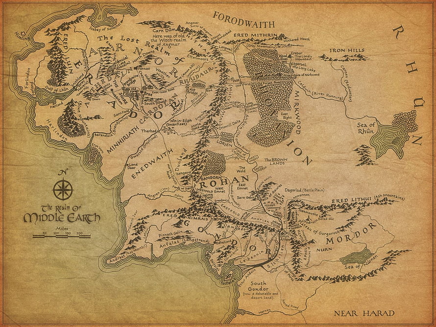 Vintage parchment style map of Middle Earth showing the Shire, Rohan, and Mordor regions HD wallpaper