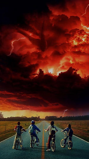 Stranger Things Kids Riding Bikes Toward a Dramatic Red Stormy Sky HD phone wallpaper