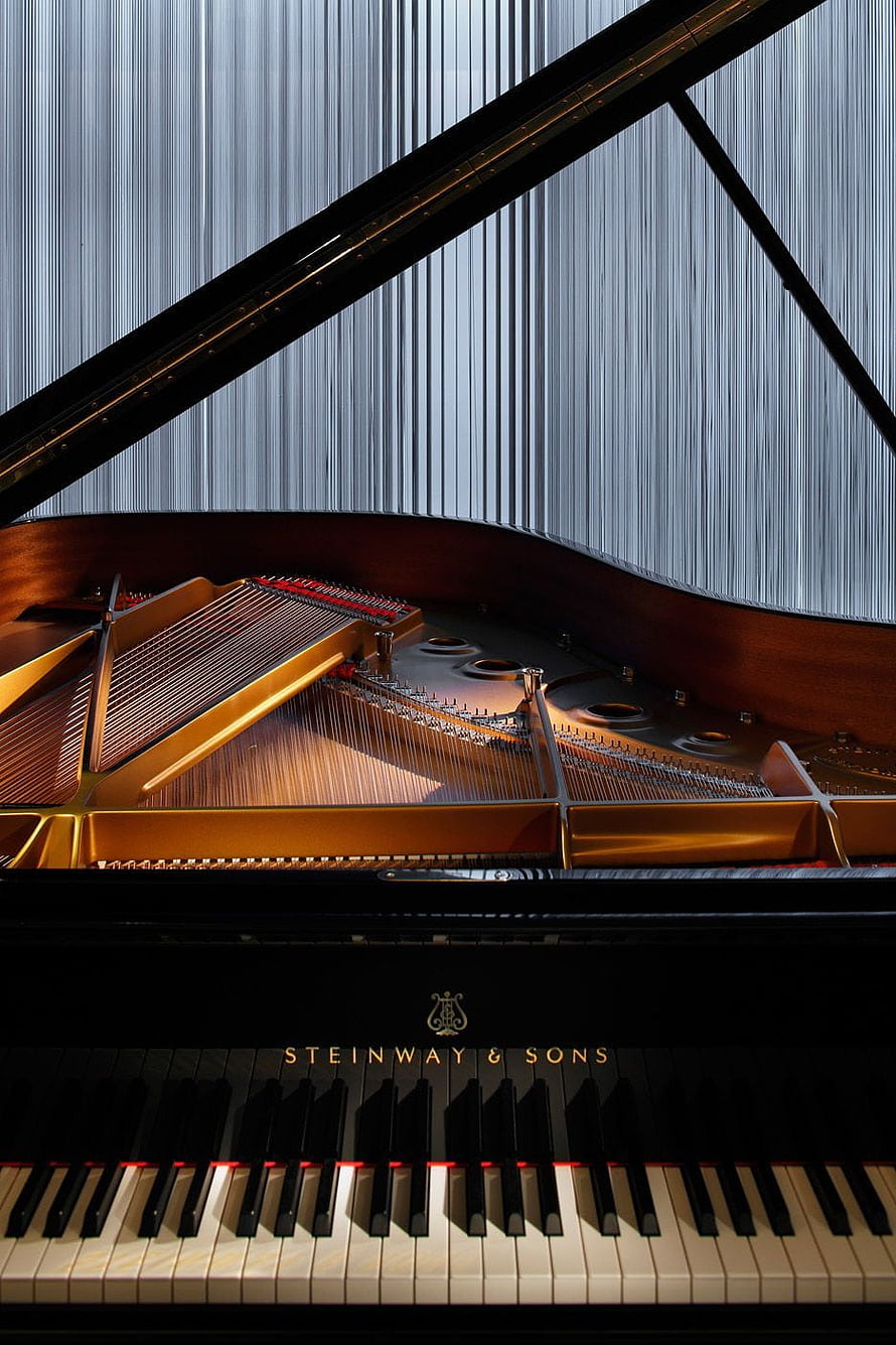 Steinway & Sons Grand Piano Interior Detail with Golden Strings and Black Keys HD phone wallpaper
