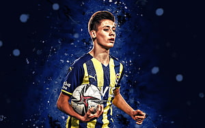 Arda Güler in Fenerbahçe Kit Holding Soccer Ball Against Dark Blue Background HD wallpaper