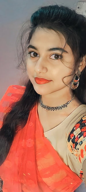 Portrait of a young woman in traditional Indian attire with vibrant orange dupatta and ornate jewelry, Beautiful girl, indian HD phone wallpaper