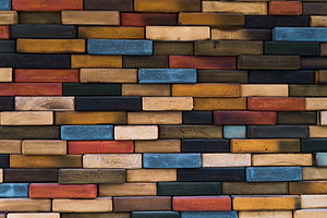 Multicolored Wooden Plank Wall Texture with Natural Grain Patterns HD wallpaper