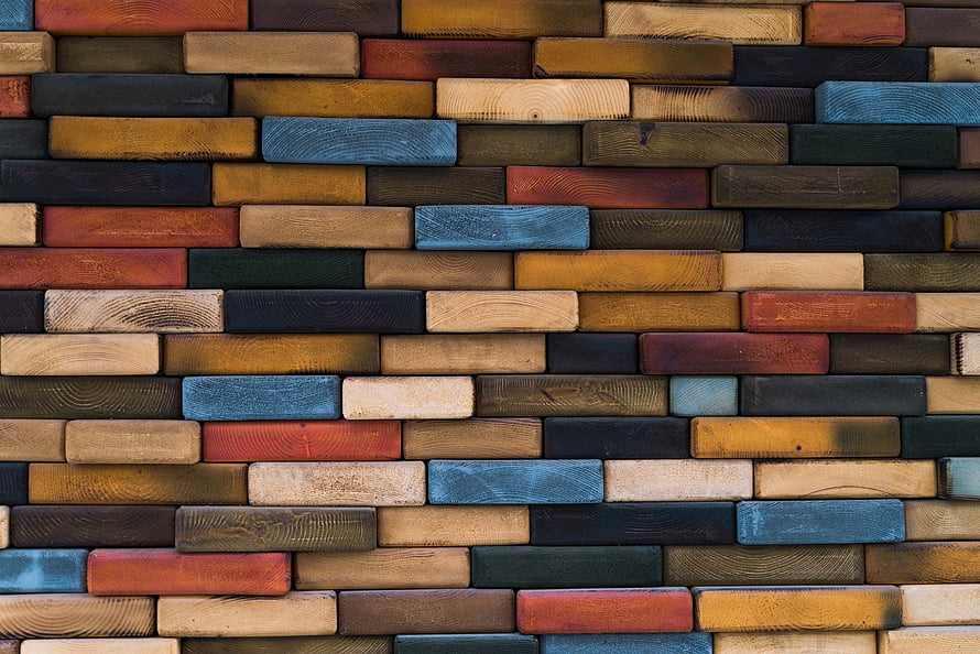 Multicolored Wooden Plank Wall Texture with Natural Grain Patterns HD wallpaper
