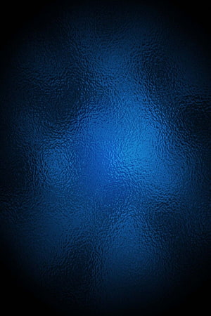 Dark Blue Textured Surface with Central Glow and Vignette Effect HD phone wallpaper