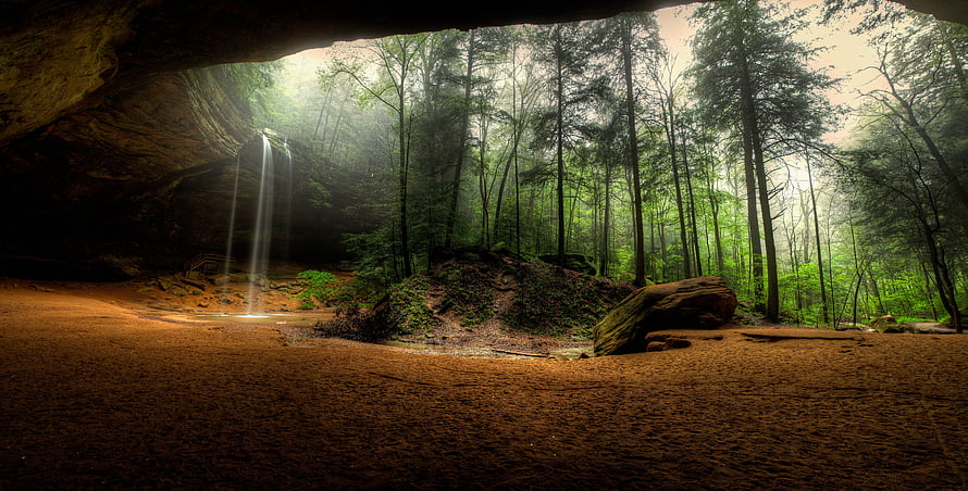 Misty Forest View From Cave Opening With Waterfall HD wallpaper