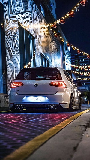 White Volkswagen Golf Mk7 GTI R Rear View Parked on City Street at Night HD phone wallpaper