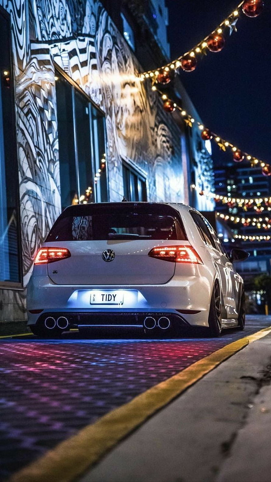 White Volkswagen Golf Mk7 GTI R Rear View Parked on City Street at Night HD phone wallpaper