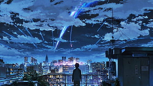 Anime Boy Watching Meteor Shower Over Tokyo Cityscape at Night HD wallpaper