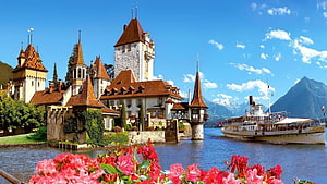 Chillon Castle on Lake Geneva with Steamship and Alpine Mountains in Switzerland HD wallpaper