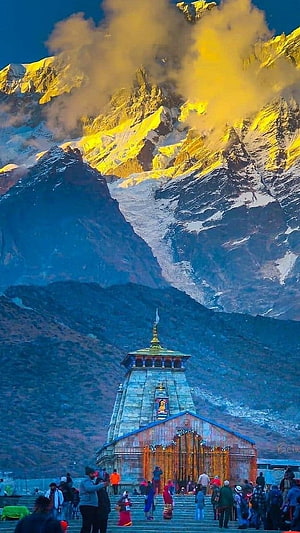 Kedarnath Temple at Sunrise with Golden Himalayan Peaks and Morning Mist HD phone wallpaper