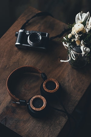 Grado Reference Series RS2e Headphones and Vintage Camera on Rustic Wooden Table HD phone wallpaper