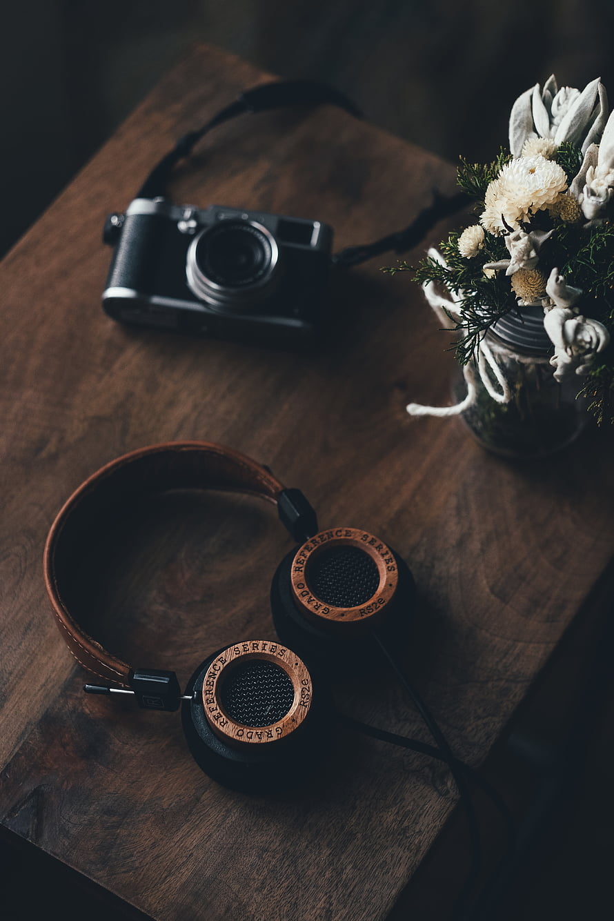 Grado Reference Series RS2e Headphones and Vintage Camera on Rustic Wooden Table HD phone wallpaper