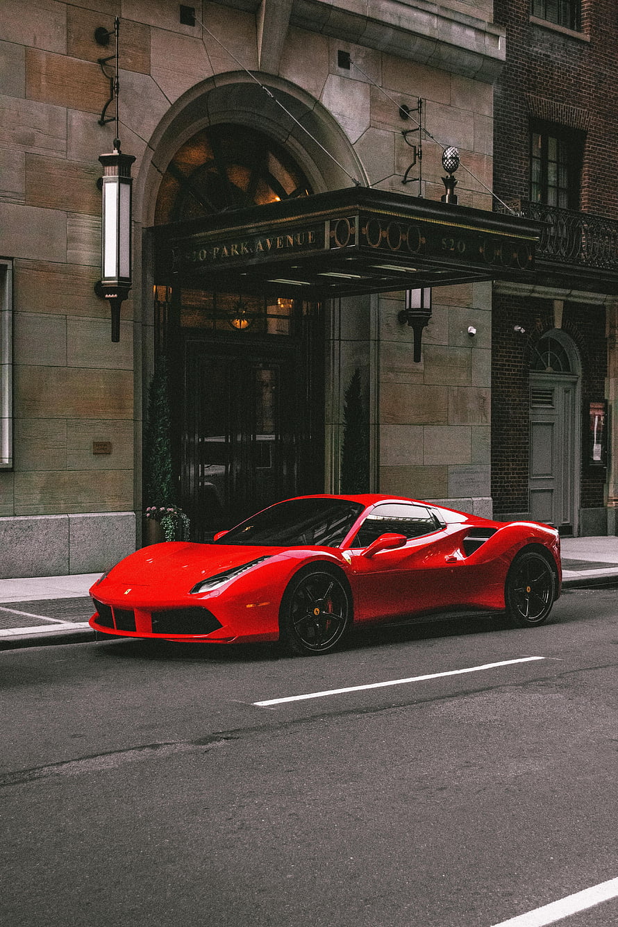 Red Ferrari 458 Italia Parked on City Street in Front of Classic Architecture HD phone wallpaper