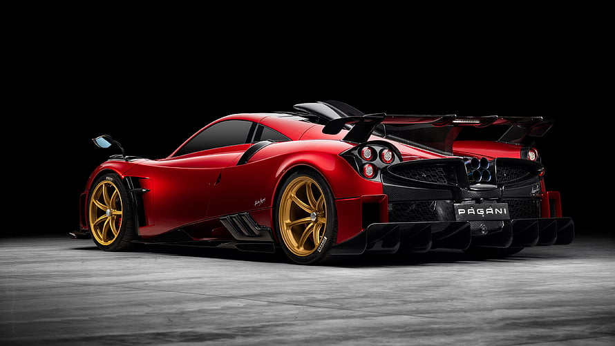 Red Pagani Huayra Imola Hypercar with Gold Wheels and Carbon Fiber Details HD wallpaper