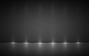 Minimalist Dark Stage with Reflective Floor and Spotlights HD wallpaper