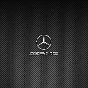 Mercedes-Benz AMG Emblem on Dark Carbon Fiber Texture HD phone wallpaper