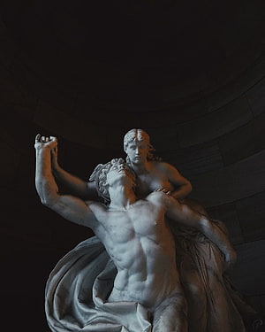Classical Marble Sculpture of a Reclining Male Figure and Standing Female Figure in a Dark Rotunda HD phone wallpaper