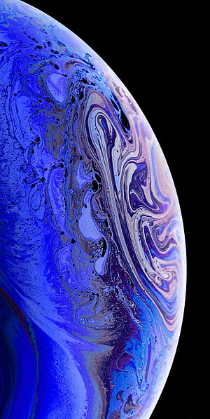 Vibrant Swirling Blue and Purple Abstract Planet Sphere Against Black Space Background HD phone wallpaper