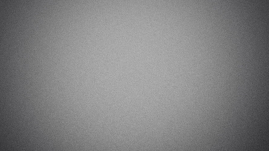 Minimalist Grey Gradient Texture with Subtle Vignette and Fine Grain HD wallpaper