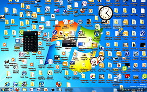 Cluttered Windows 7 Desktop with Icon Overload and Calculator Widget HD wallpaper