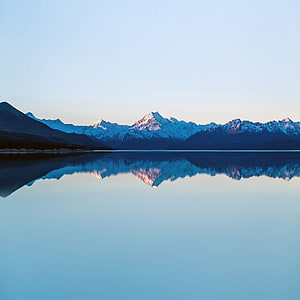 Serene Alpine Lake Reflection with Snow-Capped Peaks at Dawn HD phone wallpaper