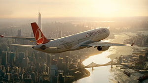 Turkish Airlines A330-300 Cruising Over Istanbul Skyline at Golden Hour HD wallpaper