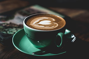 Mint Green Cappuccino Cup with Heart Latte Art on a Dark Wooden Table HD wallpaper